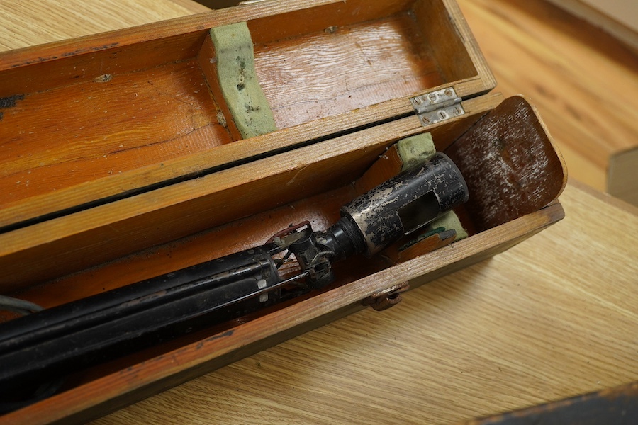 An Air Ministry First World War cased tank inspection lamp, 78cm long, together with a cased Air Ministry Interception Calculator, plywood case; 71cm wide, 24cm deep, 24cm high. Condition poor to fair.